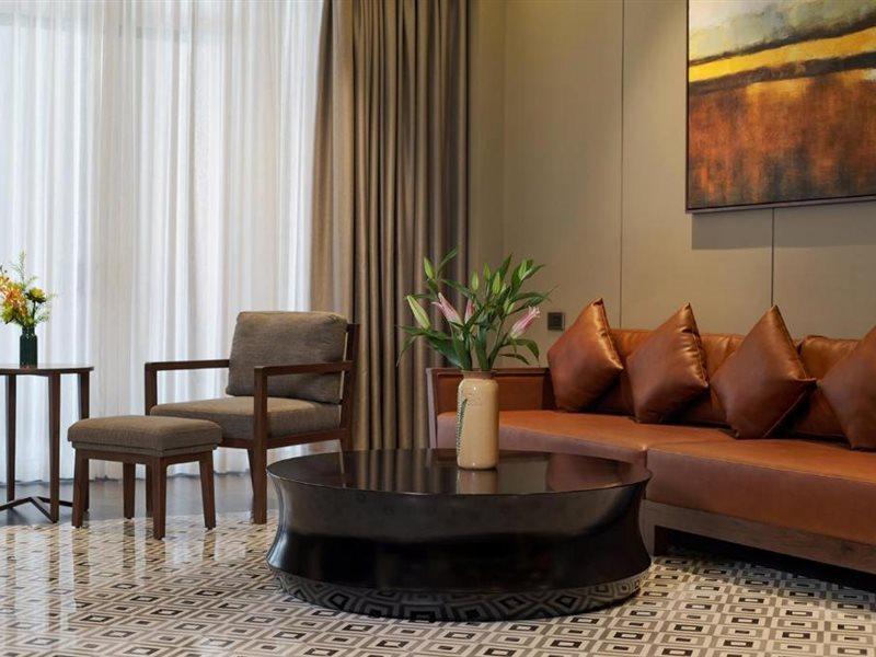 Senna Hue Hotel Exterior foto A living room at the hotel
